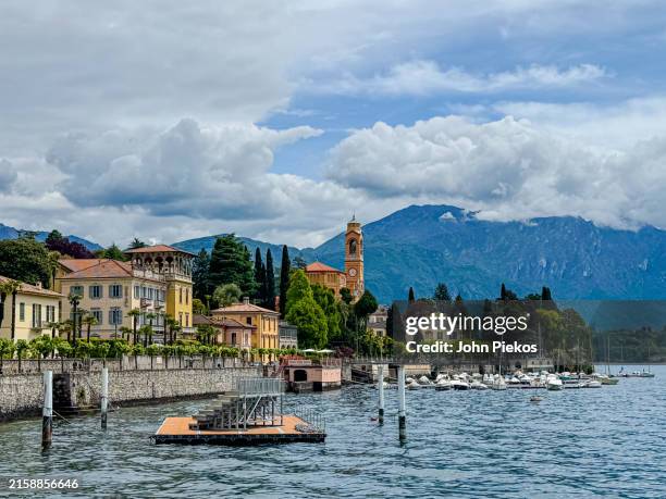the waterfront village of tremezzina, on lake como, italy - como italy stock pictures, royalty-free photos & images