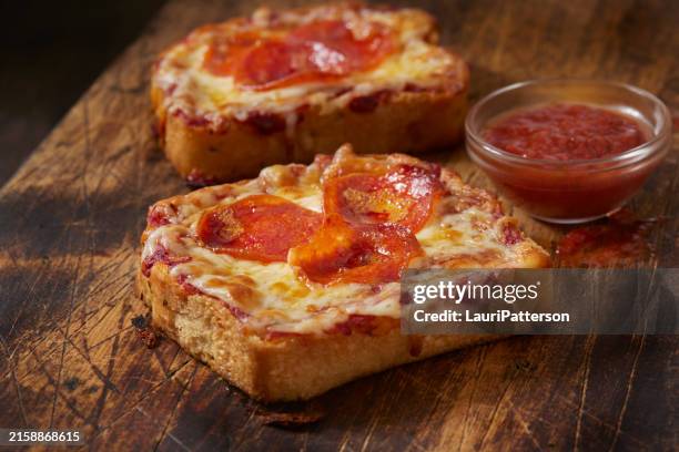 crispy air fried garlic bread pepperoni pizza - garlic bread stock pictures, royalty-free photos & images