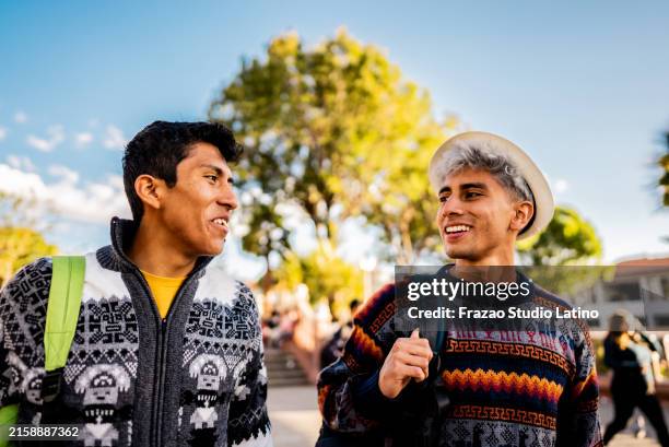 young friends talking and walking in huaraz, peru - peruvian people stock pictures, royalty-free photos & images