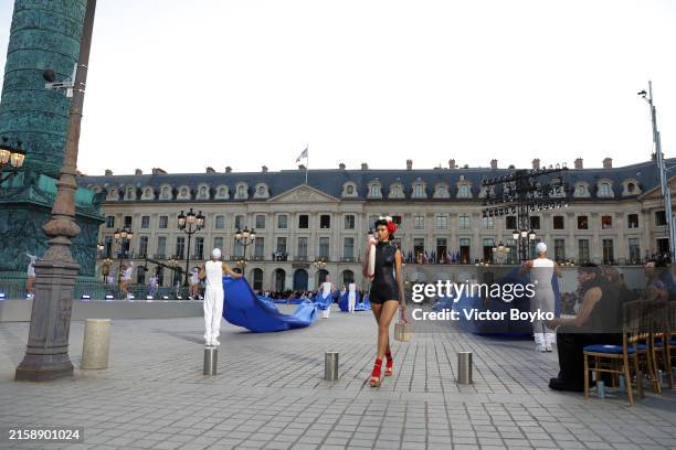 Model walks the runway during Vogue World: Paris at Place Vendome on June 23, 2024 in Paris, France.