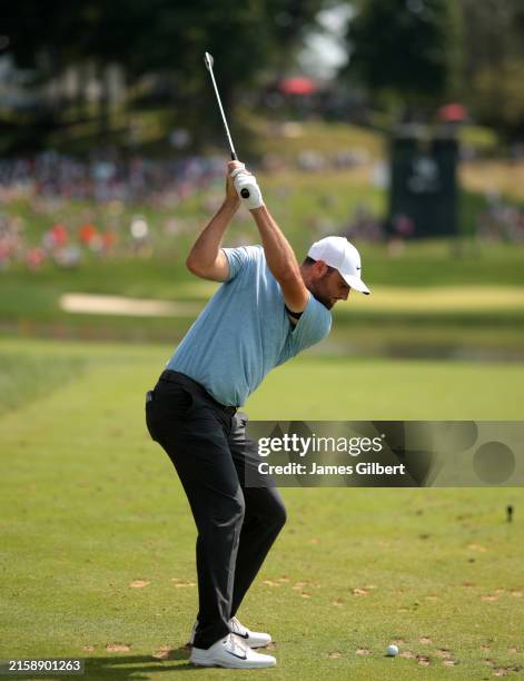 Scottie Scheffler of the United States plays his shot from the 16th tee during the final round of the Travelers Championship at TPC River Highlands...