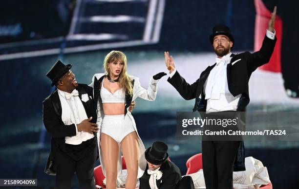 Taylor Swift is joined on stage by Travis Kelce , during "Taylor Swift | The Eras Tour" at Wembley Stadium on June 23, 2024 in London, England.