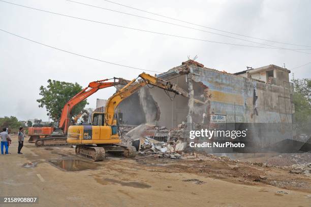 The Jaipur Development Authority is bulldozing encroachments as they are starting a campaign to widen New Sanganer Road in Jaipur, Rajasthan, India,...