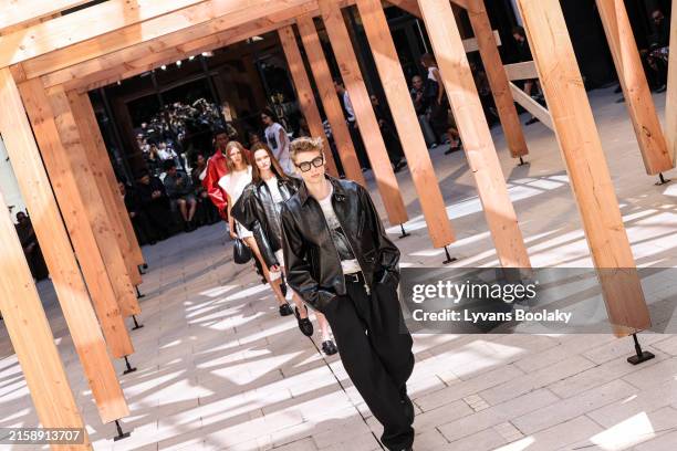 Model walks the runway during the Sacai Menswear Spring/Summer 2025 show as part of Paris Fashion Week on June 23, 2024 in Paris, France.