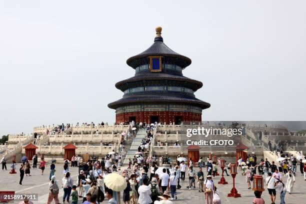 Tourists visit the Temple of Heaven Park in Beijing, China, June 27, 2024.