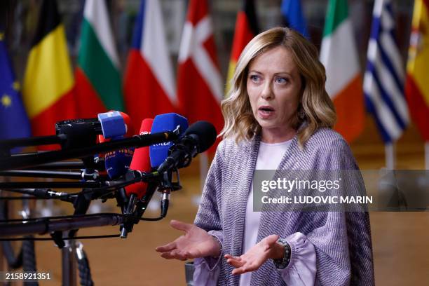 Italy's Prime Minister Giorgia Meloni speaks to the press at the end of the European Council Summit at the EU headquarters in Brussels on June 28,...
