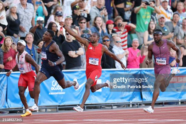 Fred Kerley, Noah Lyles and Kenny Bednarek react while crossing the finish line in the men's 100 meter final on Day Three 2024 U.S. Olympic Team...