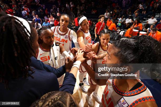 The Connecticut Sun huddle after the game against the Washington Mystics on June 27, 2024 at Capital One Arena in Washington, DC. NOTE TO USER: User...
