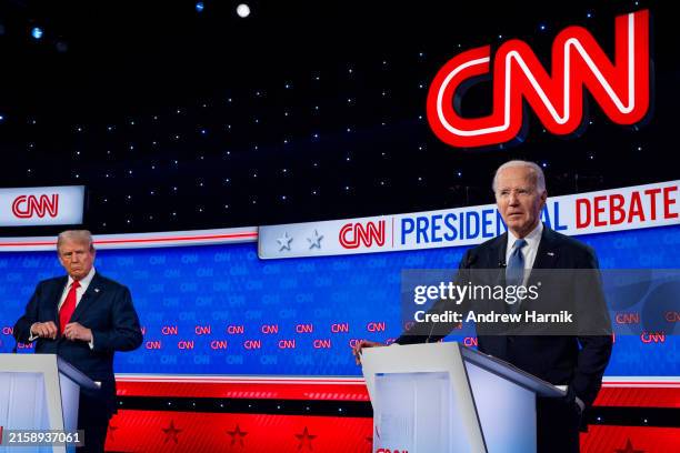 Republican presidential candidate, former President Donald Trump looks at U.S. President Joe Biden during the CNN Presidential Debate at the CNN...