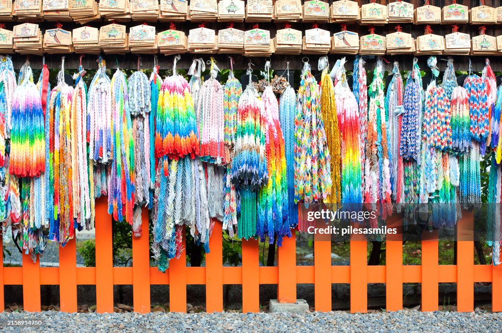 Tributes of inumerable paper cranes as a peace dedication traced back to a young girl, Sadako Sasaki, victim of the Hiroshima bomb