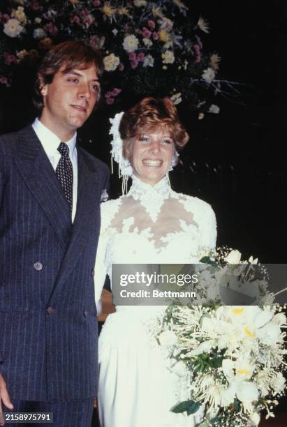 American singer Debby Boone pictured with husband Gabriel Ferrer following their wedding ceremony at the Hollywood Presbyterian Church, Los Angeles,...