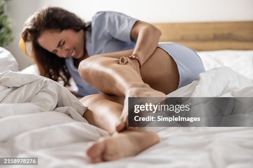 A young woman got severe cramps in her calf at night while sleeping. A young woman got severe cramps in her calf at night while sleeping.