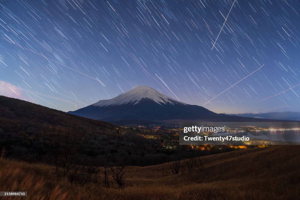 Night scenery of Mount Fuji and star trails in Yamanashi Prefecture, Japan
