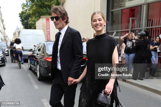 Robie Uniacke and Rosamund Pike attend the Christian Dior Haute Couture Fall/Winter 2024-2025 show as part of Paris Fashion Week on June 24, 2024 in...