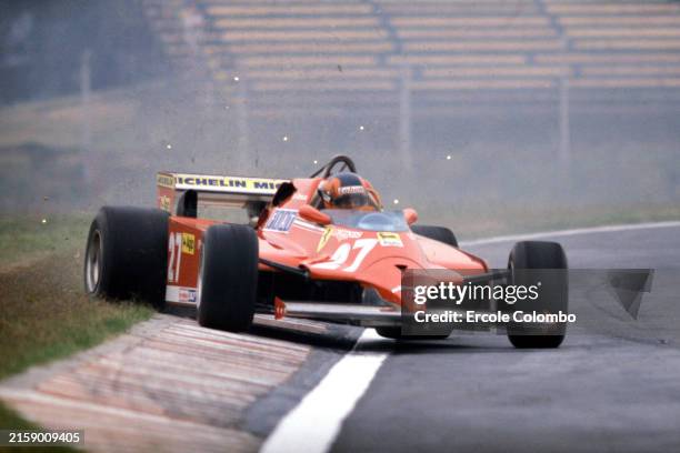 Gilles Villeneuve, Ferrari 126CK, corrects a slide as he runs wide onto the grass, kicking up sparks in the process during the Argentinian GP at...