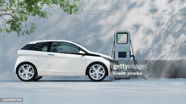 electric car charging - elektrische auto stockfoto's en -beelden