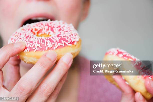 doughnuts - unhealthy living stock pictures, royalty-free photos & images