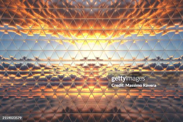 metallic surface reflecting sunset light. - spiegel boden stock-fotos und bilder