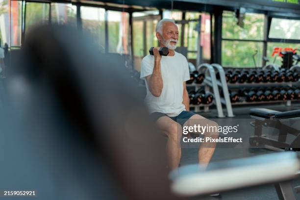 these guns are about to get pumped - differential focus stock pictures, royalty-free photos & images