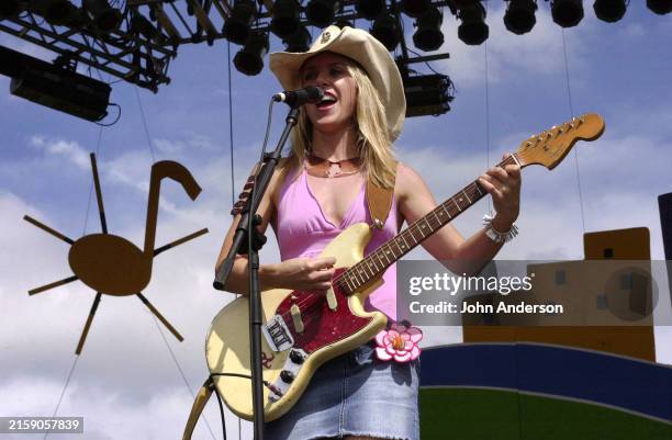 American Rock musician Liz Phair plays electric guitar as she performs onstage at the Austin City Limits Music Festival, Austin, Texas, September 19,...