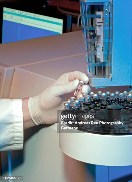 Medical Lab Tech Loading Machine 3,851 Lab Equipment Machine Stock Photos, High-Res Pictures, and Images ...