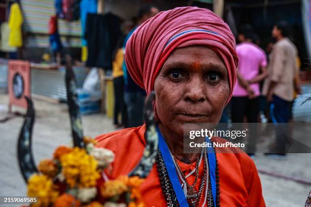 Sita Devi from UP is arriving at Nunwan basecamp from where she will leave for Amarnath Cave the next morning in Pahalgam, Jammu and Kashmir, India,...