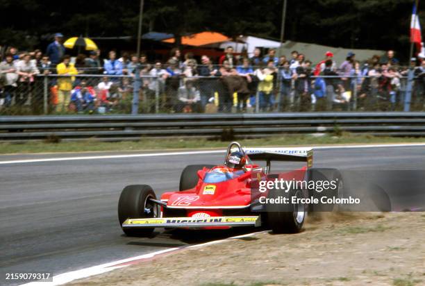 Gilles Villeneuve, Ferrari 312T4, corrects a slide as he puts a wheel on the kerb during the Belgian GP at Zolder on Sunday May 13, 1979 in...