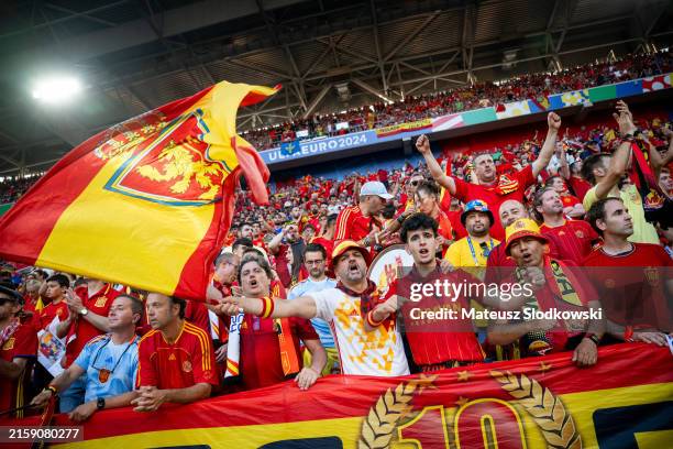 Fans from Spain sings on the tribune during the UEFA EURO 2024 group stage match between Albania and Spain at Dusseldorf Arena on June 24, 2024 in...