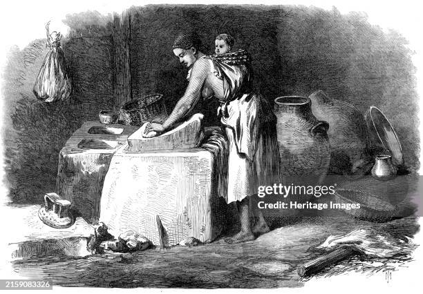 The Abyssinian Expedition: woman grinding corn in Tigre, 1868. '...a woman grinding some kind of grain, in a house visited by our Special Artist, in...
