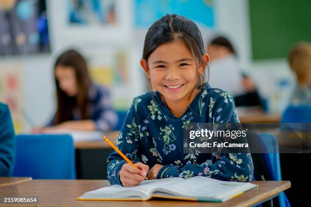 female student in class - filipina stock pictures, royalty-free photos & images