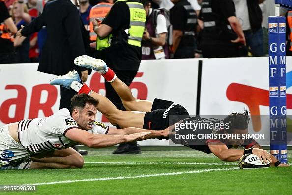 Capuzzo Rugby Toulouse's Italian full back Ange Capuozzo dives and scores a try as ...