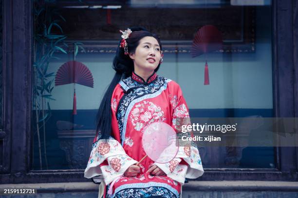 asian young woman in old traditional chinese dresses - chinese hanfu stock pictures, royalty-free photos & images