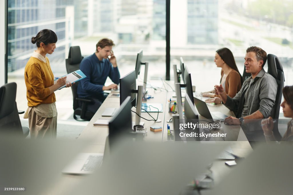 Group Of Programmers Working On Pcs In The Office High-Res Stock Photo ...