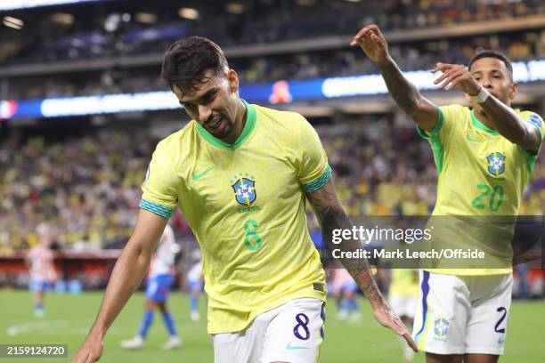 Lucas Paqueta celebrates after scoring the fifth goal for Brazil and is playfully pushed by Savio of Brazil during the CONMEBOL Copa America match...