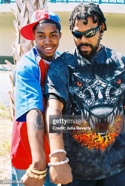 Bobby Spring Rapper Rapper Lil Scrappy and manager Serious show their matching tattoos ...