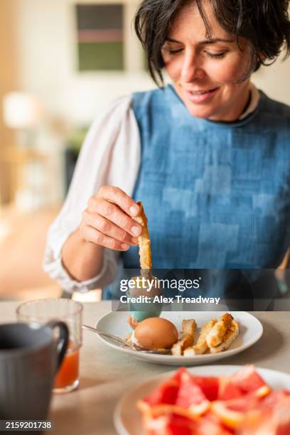 dippy eggs - boiled egg cup stock pictures, royalty-free photos & images