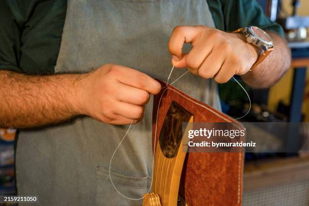 craftsman hands working - saddle bag stock pictures, royalty-free photos & images