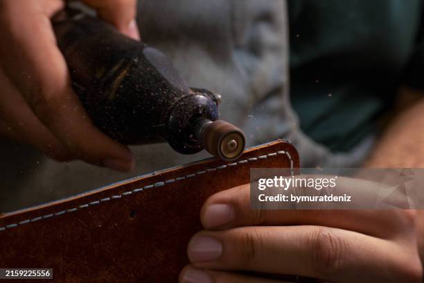 tool for sanding and polishing edges - animal skin stock pictures, royalty-free photos & images