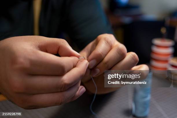 Threading Photographs 69 Threading (Manufacturing) Stock Photos, High-Res Pictures, and ...