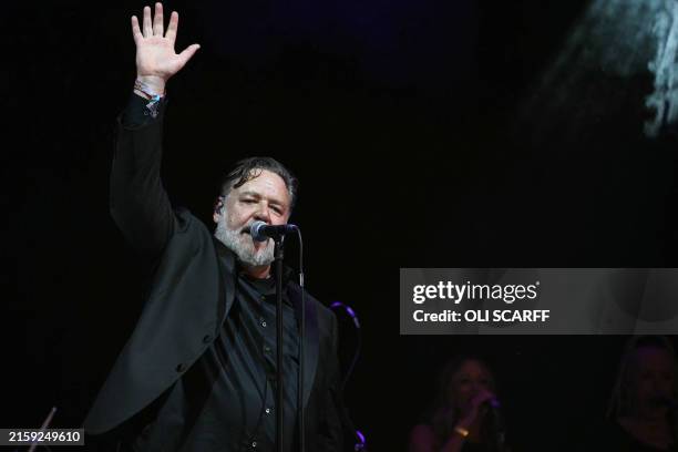 New Zealand born actor Russell Crowe sings with his band in the acoustic tent on the fourth day of the Glastonbury festival at Worthy Farm in the...