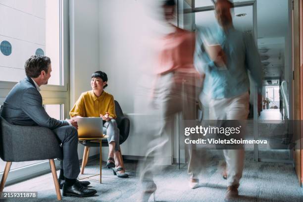 business partners on meeting in the office. - man walking silhouette stock pictures, royalty-free photos & images