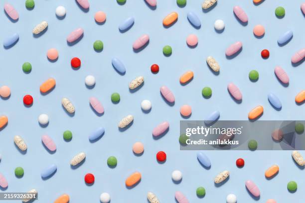 pills background - comprimido imagens e fotografias de stock