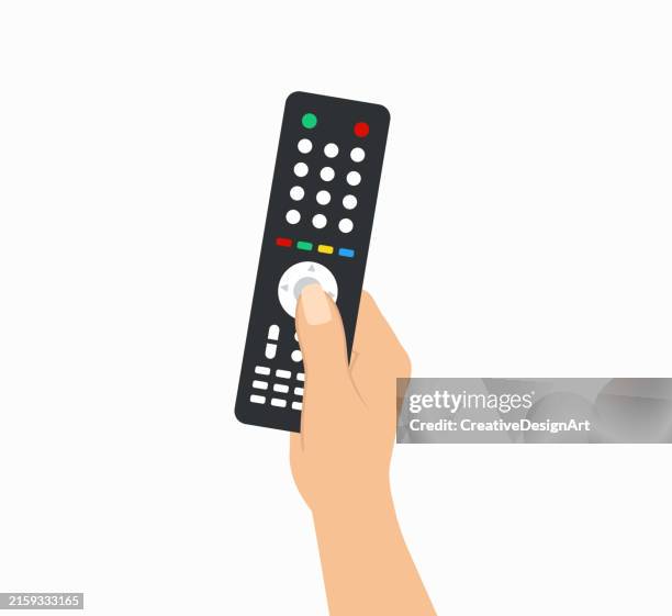 nahaufnahme der hand, die die fernbedienung hält - fernbedienung stock-grafiken, -clipart, -cartoons und -symbole