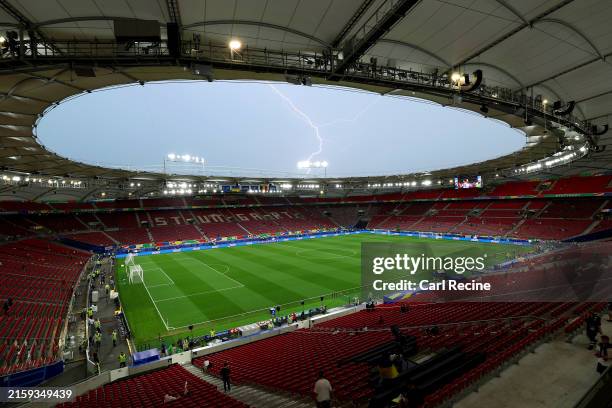 General view inside the stadium as a lightning is seen prior to the UEFA EURO 2024 group stage match between Ukraine and Belgium at Stuttgart Arena...