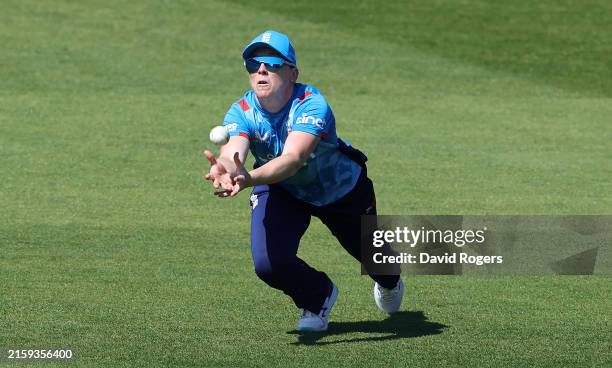 Heather Knight of England catches Brooke Halliday to close the New Zealand innings during the !st Women's Metro Bank ODI international match between...