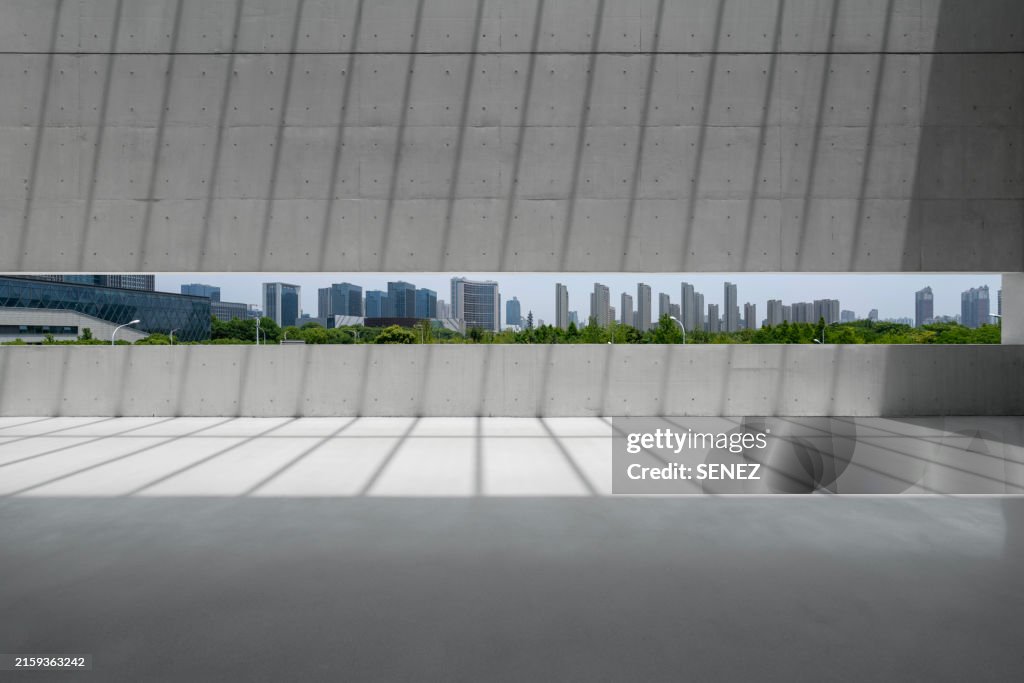 View of Cityscape from concrete building window