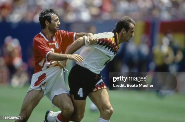Bulgarian footballer Hristo Stoichkov and German footballer Jürgen Kohler in action during the FIFA World Cup Quarterfinal match between Bulgaria and...
