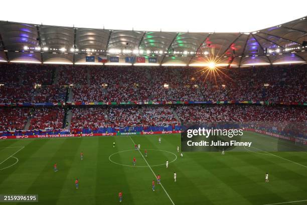 General view inside the stadium as the sun sets during the UEFA EURO 2024 group stage match between Czechia and Turkiye at Volksparkstadion on June...