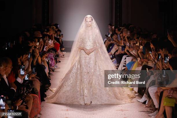 Model walks the runway during the Elie Saab Haute Couture Fall/Winter 2024-2025 show at Musee des Arts Decoratifs as part of Paris Fashion Week on...