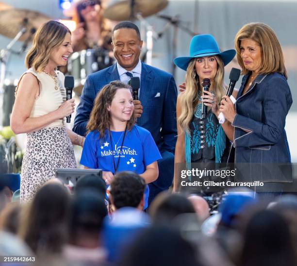 Savannah Guthrie, Craig Melvin, singer-songwriter and actress Lainey Wilson and Hoda Kotb are seen on stage with Make-A-Wish superfan Payton during...